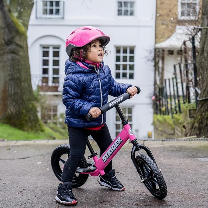 Strider 12” Sport Bike - No Pedal Balance Bicycle for Kids 1 to 4 Years - Includes Safety Pad, Padded Seat, Mini Grips & Flat-Free Tires - Tool-Free Assembly & Adjustments