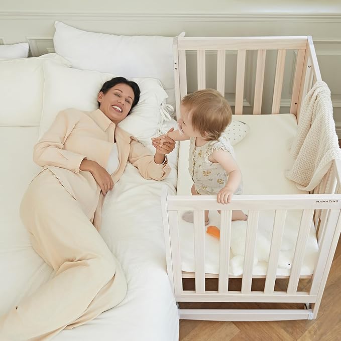 EvoNest Baby Crib, 6 in 1 Convertible Mini Crib with Wheels, 100% New Zealand Solid Wood Growing Bed, 4 Adjustable Mattress Height，Washed Natural