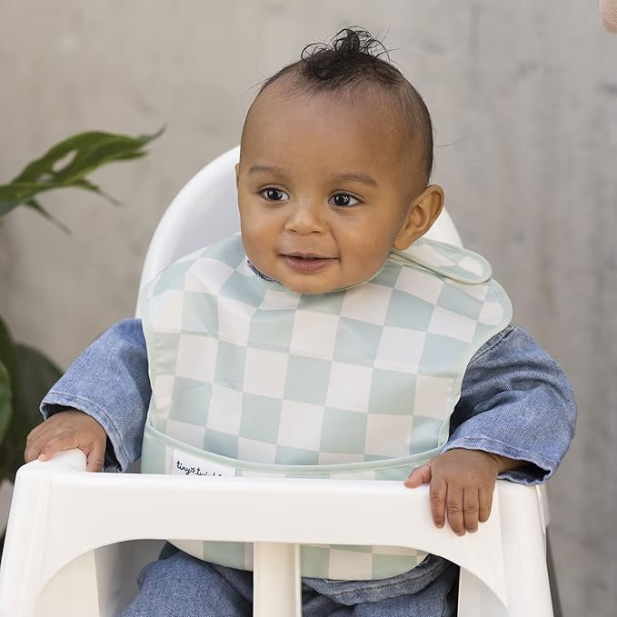 Tiny Twinkle Mess-Proof Baby Bib - Waterproof Bib for Baby Boy or Girl - Machine Washable - Adjustable Closure - PVC, BPA, & Phthalate Free - Great for Travel - Baby Food Bibs (3 Pack, Checkers Boy)