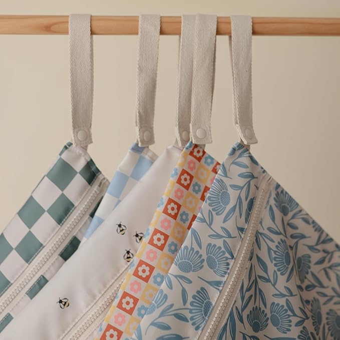 mushie Water Resistant Wet Bags | Large & Small Reusable Storage Bag for Baby Items and Travel | Zippered Pockets with Handle | Machine Washable, Set of 2 (Blue Flowers)